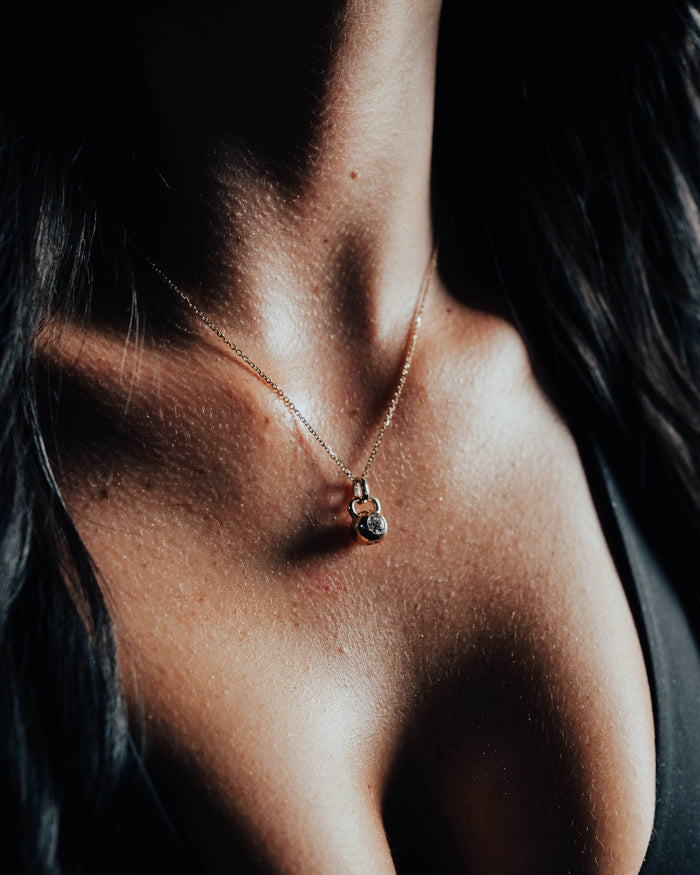 The Signature kettlebell pendant in solid 14k gold