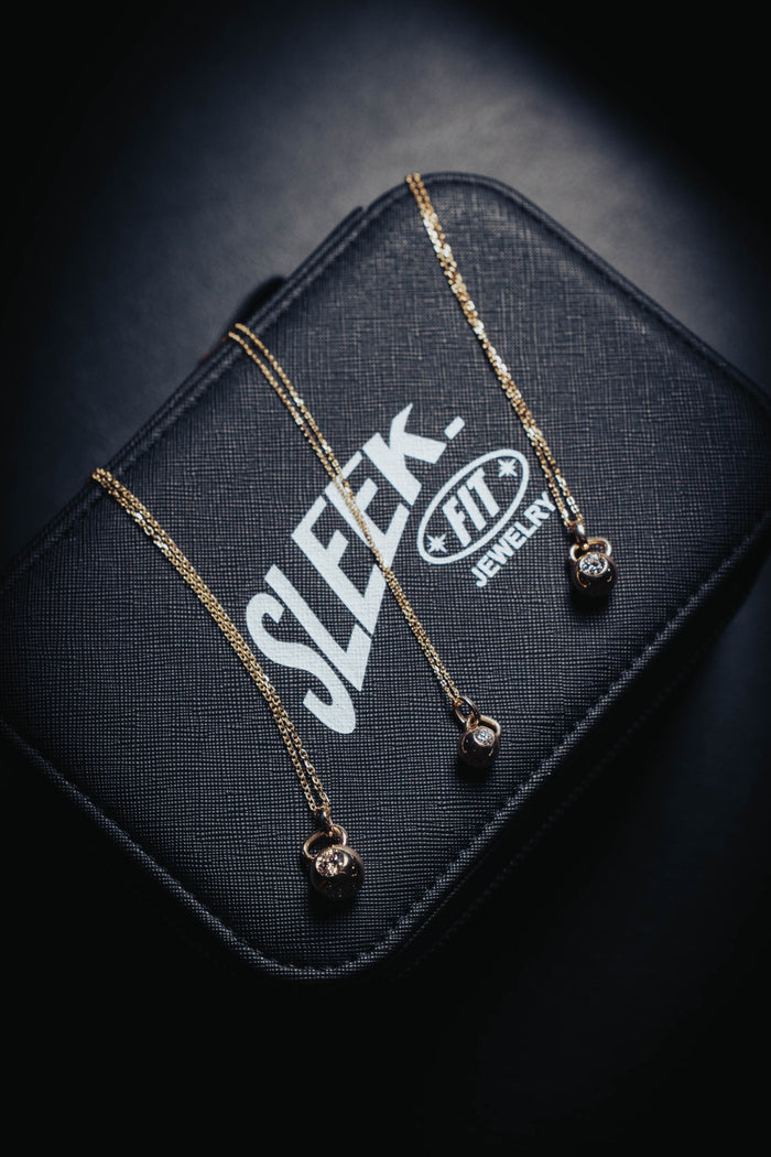 The Signature kettlebell pendant in solid 14k gold