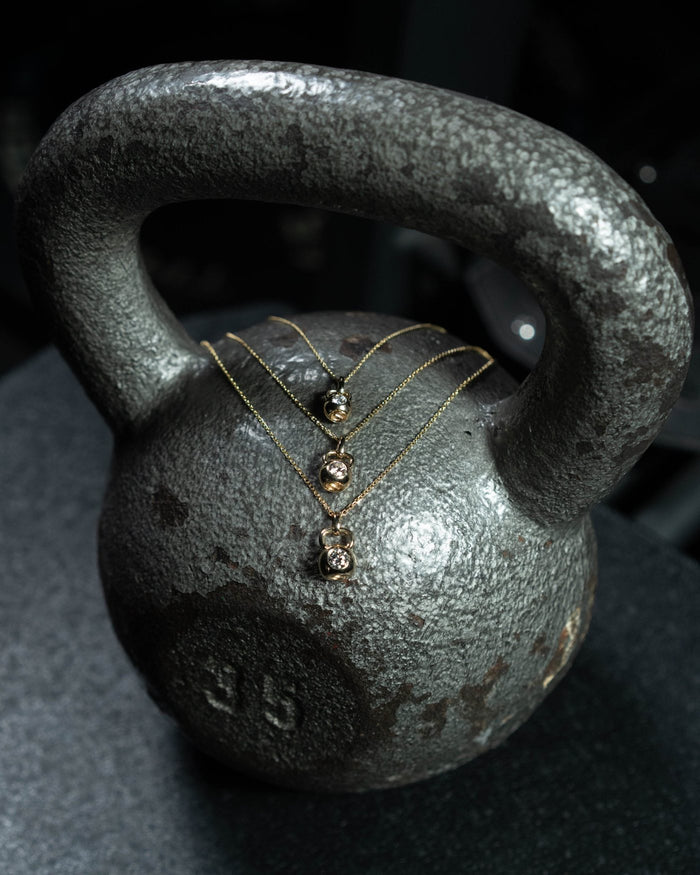 The Signature kettlebell pendant in solid 14k gold